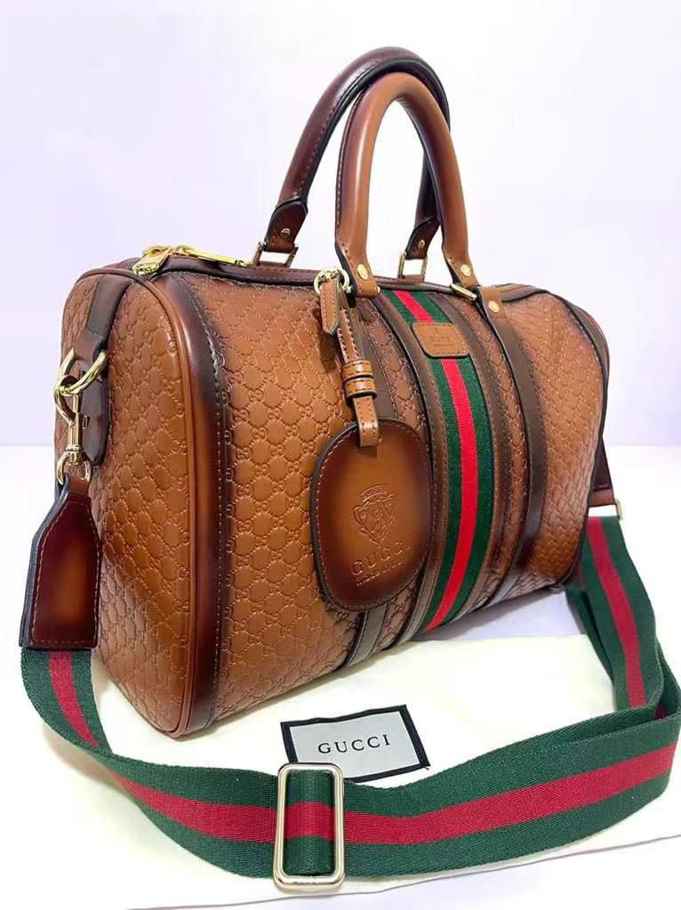 Gucci Monogram Leather Travel Bag – Brown
